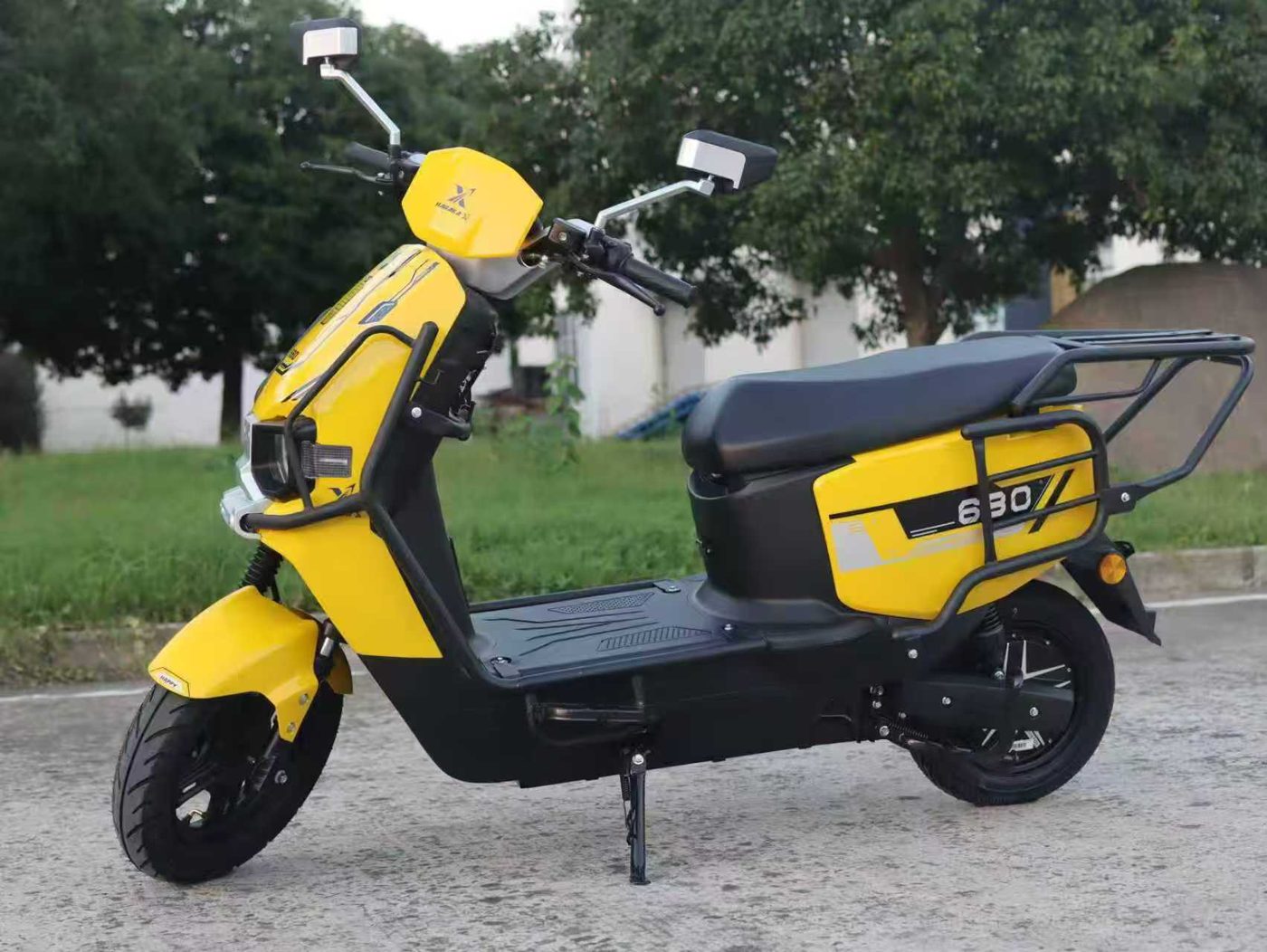 Xiaote X1 yellow electric scooter with cargo rack